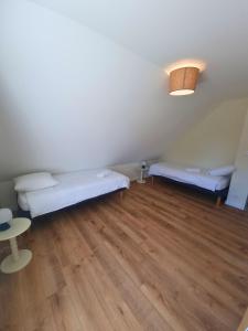 Maisons de vacances Maison proche de la mer : photos des chambres