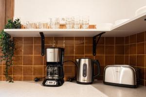 Appartements Maison Olivier Confort et Modularite : photos des chambres