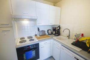 Appartements Le Grand Bleu : photos des chambres