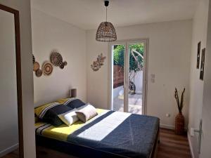Maisons de vacances Maison climatisee avec exterieur : photos des chambres