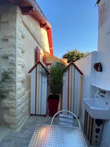 Appartements Coconbeach la plage a la ville : photos des chambres
