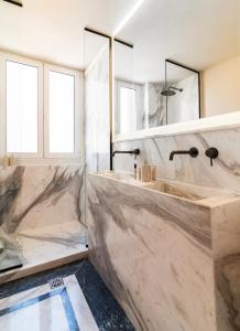 Acropolis 1910s Neoclassical Gem Marble Bathrooms