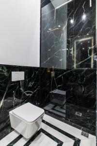 Acropolis 1910s Neoclassical Gem Marble Bathrooms
