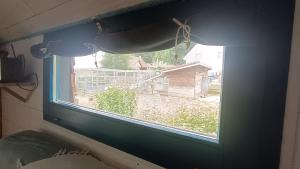 B&B / Chambres d'hotes La roulotte tiny house du Mond'ideal : photos des chambres