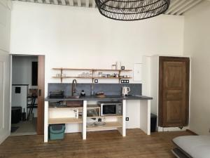 Appartements L-atelier et la chambre des toiles : photos des chambres