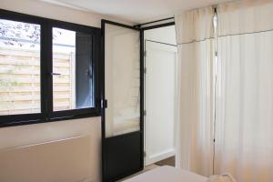 Maisons de vacances Charming house in Montreuil with terrace : photos des chambres