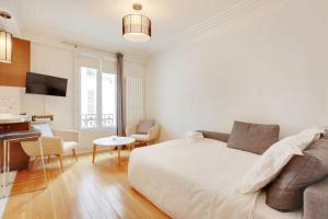 Appartements Charming studio EIFFEL TOWER - Paris 16 : photos des chambres