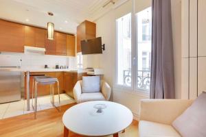 Appartements Charming studio EIFFEL TOWER - Paris 16 : photos des chambres