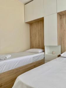 Curri Apartment in Twin Tower- modern Apartament 4 people, 3 min from the Beach
