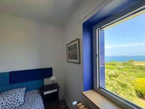 Maisons de vacances Kermartin - Maison de famille avec vue sur la baie de Morlaix : photos des chambres