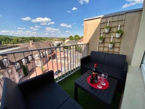 Appartements Le Perchoir-WIFI-Face a la Gare-Terrasses-Proche tous commerces : photos des chambres