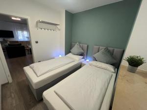 Belisima Apartments I Ferienwohnung Ruppertsberg R03 - Reiterpfad I separater Schlafbereich mit Boxspringbetten I Waschmaschine I Parkplatz I Nähe Supermarkt - Bäcker - Bahnhof