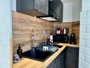 Appartements Le Perchoir-WIFI-Face a la Gare-Terrasses-Proche tous commerces : photos des chambres