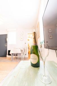 Appartements Elegance et Bien-etre dans notre T2 a Epernay : photos des chambres