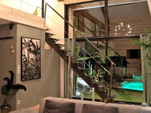 Maisons de vacances Loft cosy avec piscine et spa, a 10 min de Vichy, proche golf et nature - FR-1-489-337 : photos des chambres