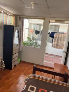 Hab Simple baño compartido Estudiante o Voluntario terraza vista a los Volcanes