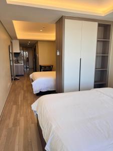 LCONDOTEL Serviced Apartment near MOA NAIA PITX with Pool Parking