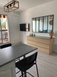 Appartements Bright studio in residence with swimming pool : photos des chambres