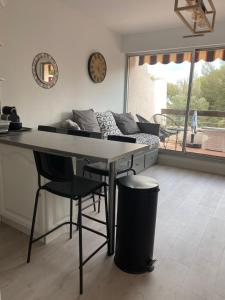 Appartements Bright studio in residence with swimming pool : photos des chambres