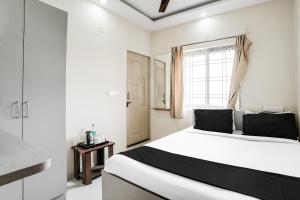 Super Hotel O Bangalore Near Reva Circle Formerly CKA Boarding