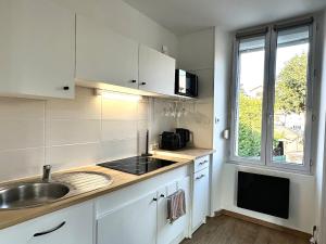 Appartements Le Cocon Bourcain : photos des chambres