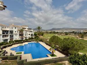 Chic apartment with lovely terrace, pool & golf view