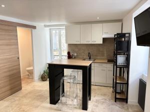 Appartements Chaleureux T1 avec Balcon : photos des chambres