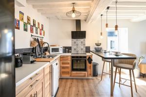 Appartements A Fleur de Quai - Vue sur le port : photos des chambres