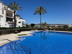 Chic apartment with lovely terrace, pool & golf view