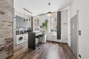 Appartements T1 meuble a la Blancarde RDC : photos des chambres