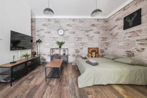 Appartements T1 meuble a la Blancarde RDC : photos des chambres