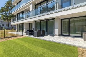 Urokliwy Apartament z Ogródkiem 150 m od Plaży Parking Międzywodzie by Noclegi Renters