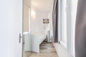 Appartements Marais proche du Theatre Renard : photos des chambres