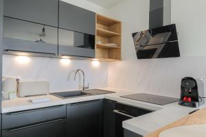 Appartements Cosy et Design proche Groupama Stadium : photos des chambres