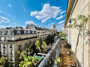 Paris rooftop retreat with sunny balcony