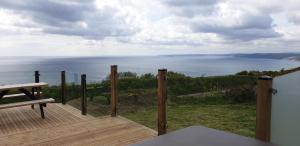 Sunset sea view chalet with hot tub