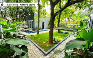 The Calms Villa by Travent Mug