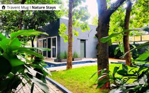 The Calms Villa by Travent Mug