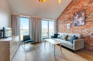 Szafarnia Luxury Apartments on the Motława River Gdańsk by Noclegi Renters