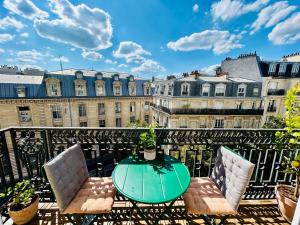Paris rooftop retreat with sunny balcony
