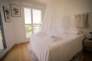 Appartements Le Dock - Moderne Calme Metro 14 : photos des chambres