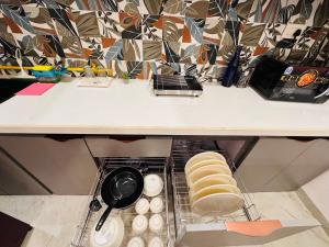 HomeEscape Elite 1BHK - Mahalaxmi Nagar 201