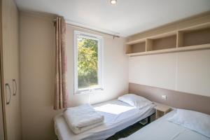 Appartements Mobilhome 1 Tout Confort : photos des chambres