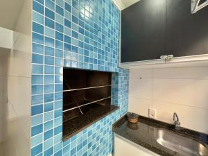 Apartamento no centro, 2 quadras do mar com ar condicionado, vaga de garagem e elevador