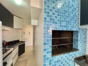 Apartamento no centro, 2 quadras do mar com ar condicionado, vaga de garagem e elevador