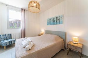 Appartements Domaine du Flamand - Gites du Flamand cote Piscine : photos des chambres