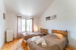 Appartements Domaine du Flamand - Gites du Flamand cote Piscine : photos des chambres