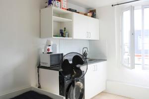 Appartements Cosy fully-equipped studio near Paris : photos des chambres