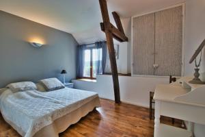 Maisons de vacances Grange authentique avec vue, piscine chauffee et Wifi : photos des chambres