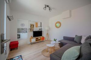 Maisons de vacances Charming house with garden, center of Puilboreau : photos des chambres